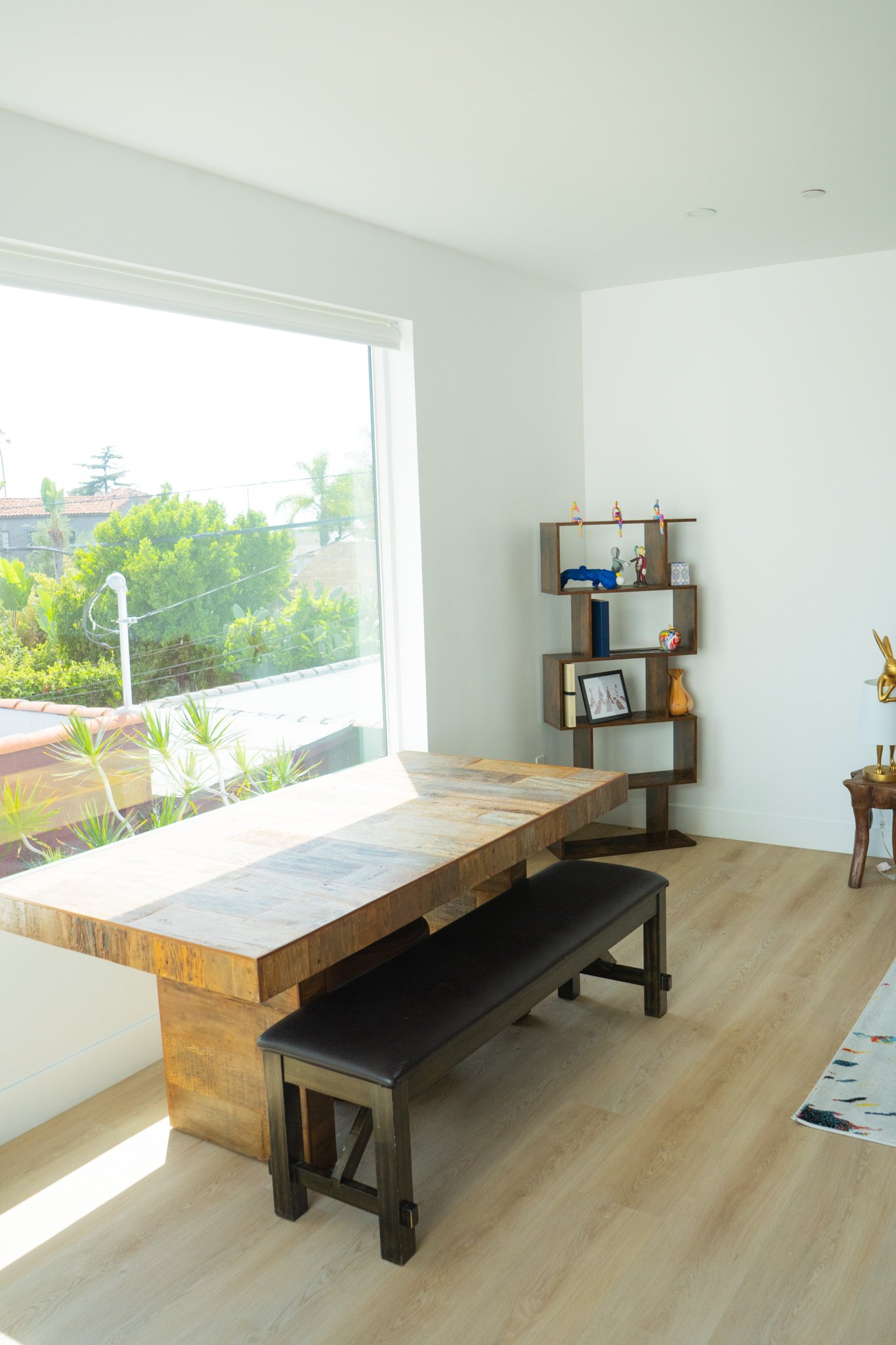 Dining area overlooking the green backyard
